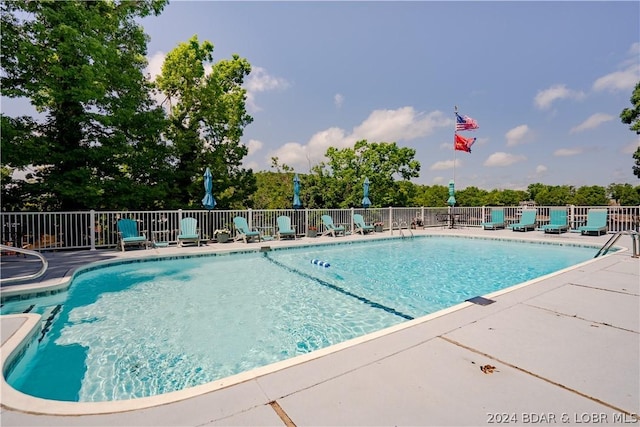 33 Crow Ct Unit 1D, Lake Ozark, MO 65049 - community pool featuring a patio