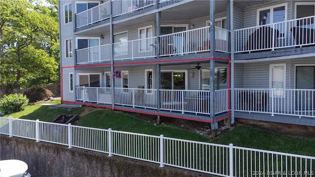 view of property featuring fence