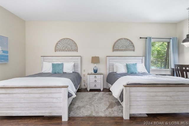 bedroom featuring dark hardwood / wood-style floors