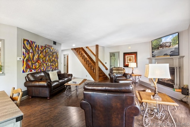 living room featuring dark hardwood / wood-style floors