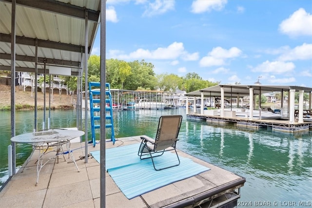 dock area featuring a water view