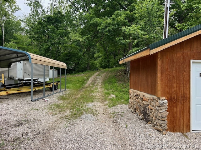 view of yard with a carport