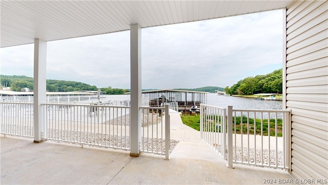 view of patio / terrace with a water view