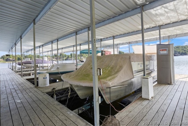 view of dock with a water view