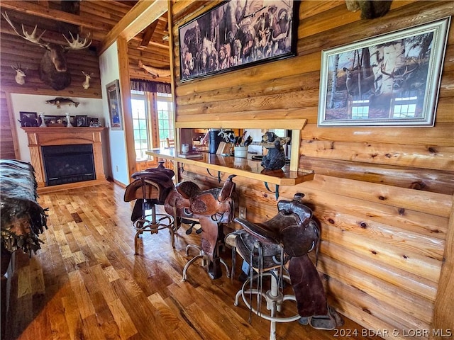 27271 Little Buffalo Rd, Stover, MO 65078 - interior space featuring beamed ceiling, hardwood / wood-style floors, and a fireplace