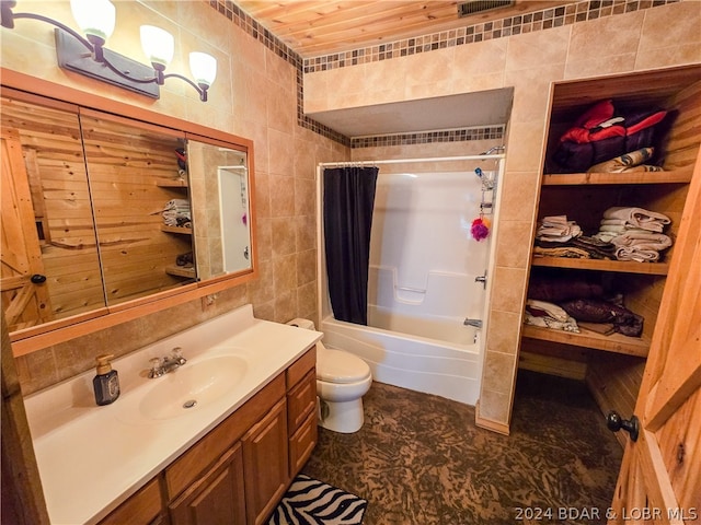 full bathroom with shower / bath combo, toilet, wooden ceiling, tile walls, and vanity