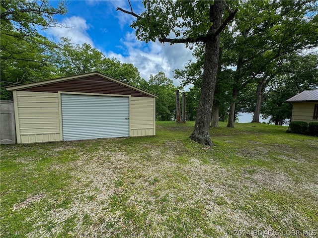 garage with a yard