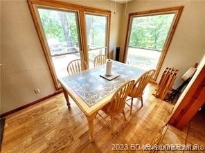 dining space featuring light hardwood / wood-style flooring