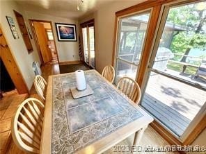 dining area with light hardwood / wood-style flooring