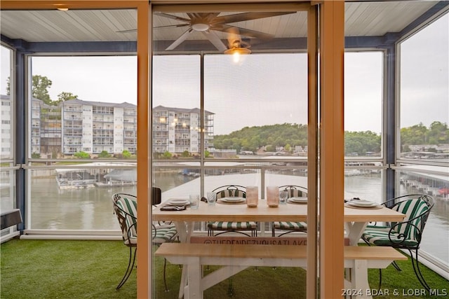 sunroom with a water view