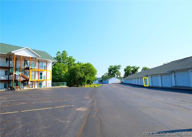 view of street with community garages