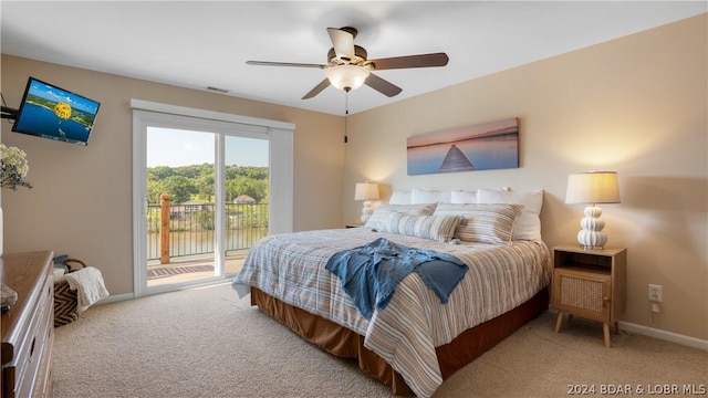 bedroom with ceiling fan, access to outside, and light carpet