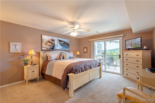 bedroom with access to outside, ceiling fan, and light carpet