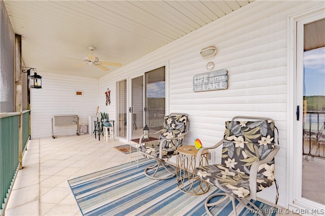 view of patio / terrace featuring ceiling fan