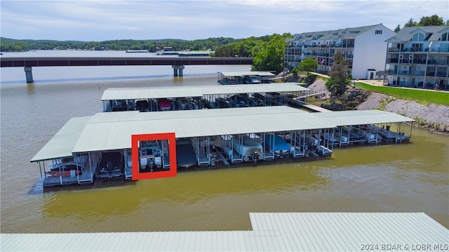 dock area featuring a water view