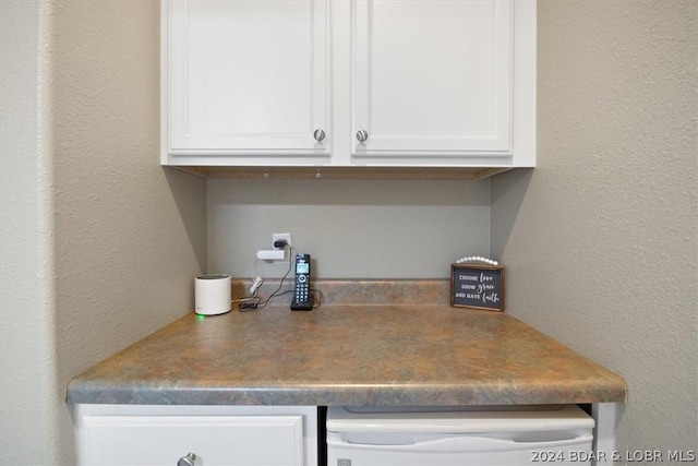 interior space featuring white cabinets