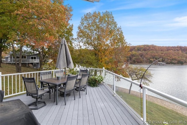 deck featuring a water view