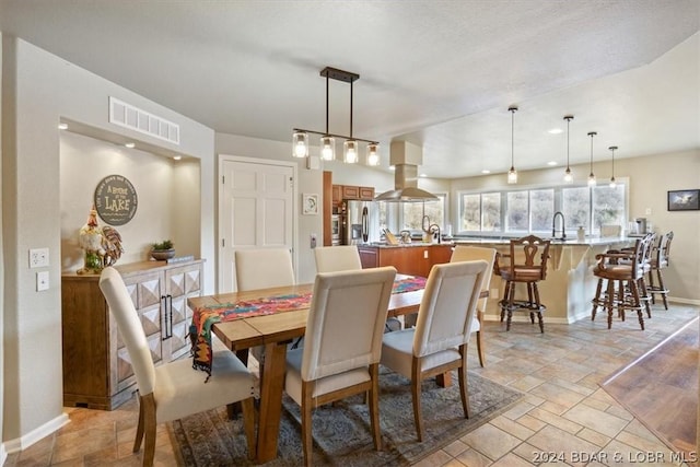 dining area featuring sink