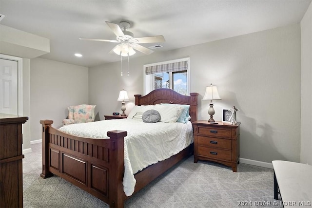 carpeted bedroom featuring ceiling fan