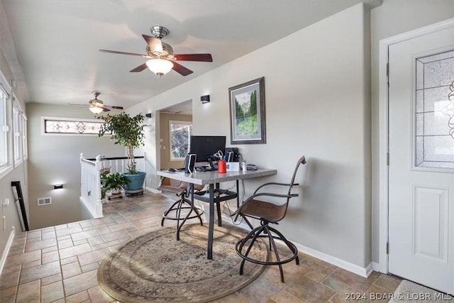 dining area with ceiling fan