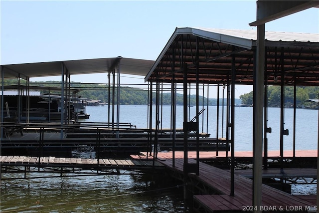 dock area featuring a water view