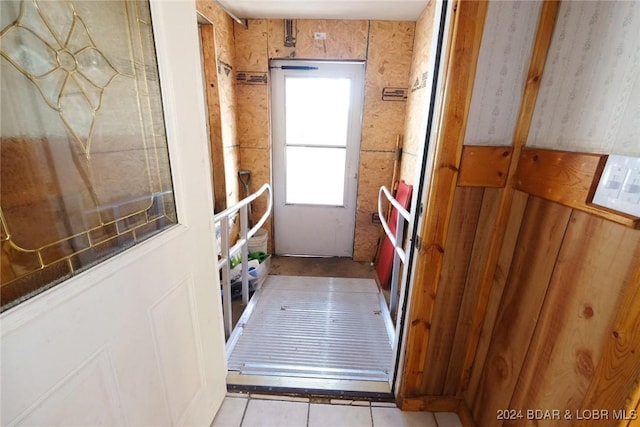 hallway featuring light tile patterned flooring