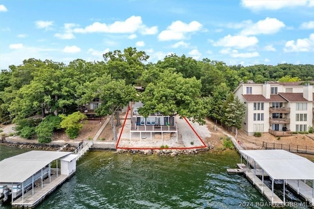 view of dock with a water view and boat lift