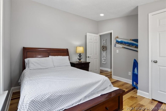 bedroom featuring light wood-type flooring