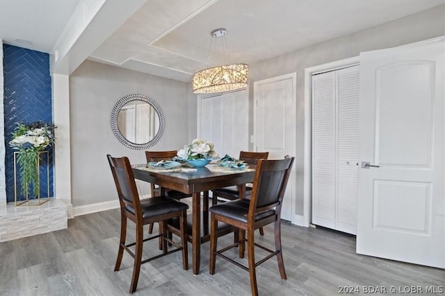 dining space featuring hardwood / wood-style floors