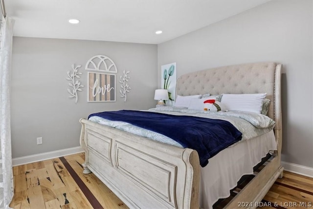 bedroom featuring hardwood / wood-style flooring