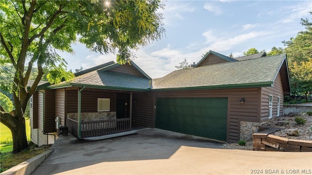 log cabin with a garage