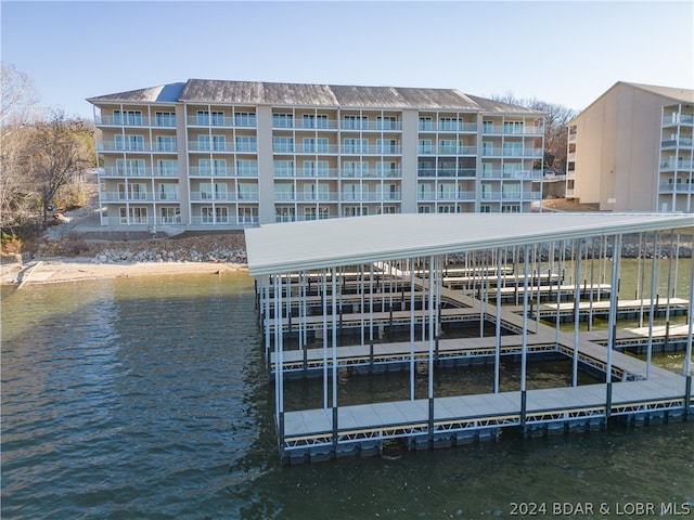 dock area with a water view