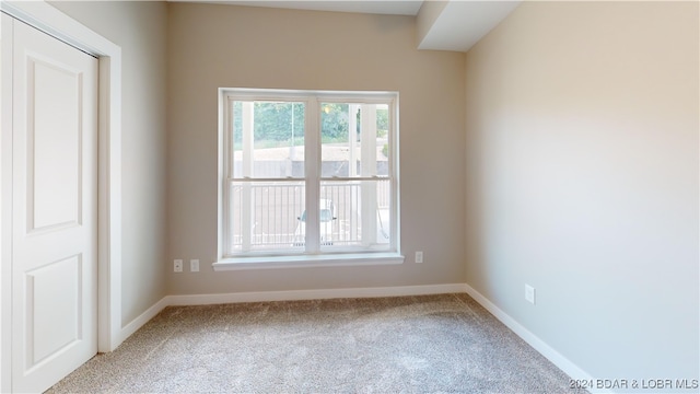 view of carpeted spare room