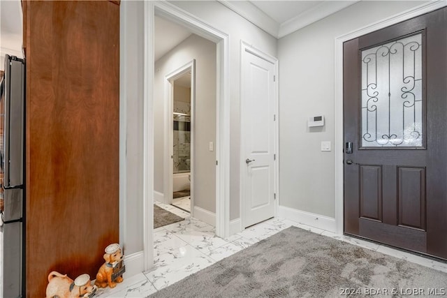 entrance foyer with ornamental molding