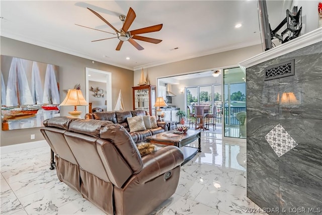 living room with ceiling fan and ornamental molding