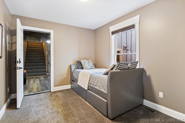 bedroom featuring carpet