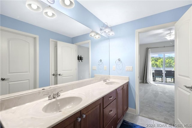 bathroom featuring vanity, tile patterned floors, and ceiling fan