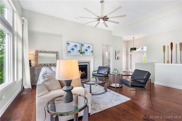 30 Southern Pine Ln, Four Seasons, MO 65049 - living area featuring healthy amount of natural light, a lit fireplace, and ceiling fan