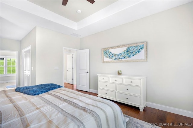 30 Southern Pine Ln, Four Seasons, MO 65049 - bedroom with wood finished floors, a ceiling fan, and a tray ceiling