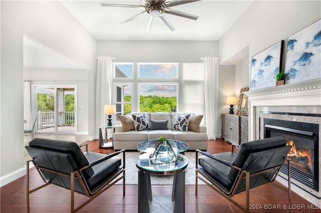 30 Southern Pine Ln, Four Seasons, MO 65049 - living room with ceiling fan, a tiled fireplace, and wood finished floors
