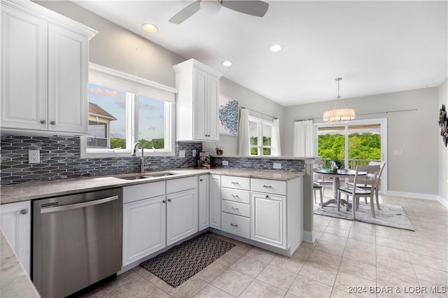30 Southern Pine Ln, Four Seasons, MO 65049 - kitchen with stainless steel dishwasher, a peninsula, plenty of natural light, backsplash, and recessed lighting