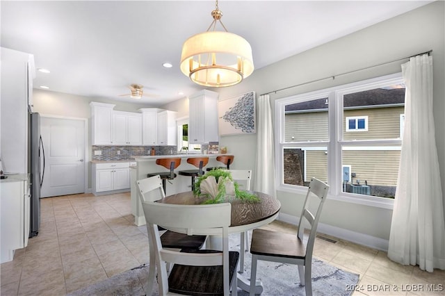 30 Southern Pine Ln, Four Seasons, MO 65049 - dining space with light tile patterned flooring and recessed lighting