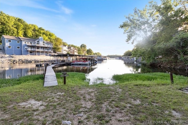 dock area featuring a water view