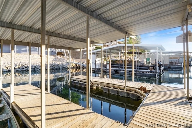 view of dock with a water view