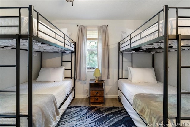 bedroom featuring wood-type flooring