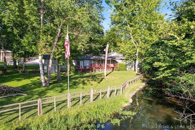 view of yard with a water view