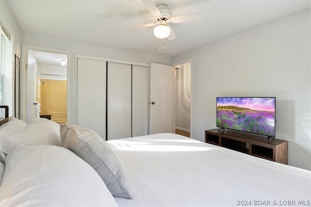 bedroom featuring ceiling fan and a closet