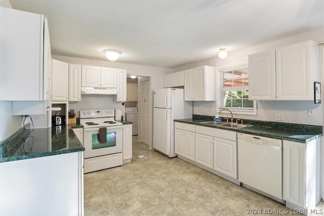 kitchen featuring sink, white cabinets, a textured ceiling, white appliances, and washer / dryer