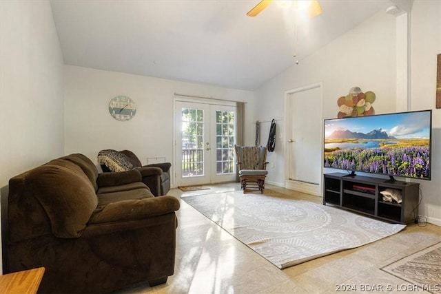 living room featuring ceiling fan, french doors, and vaulted ceiling