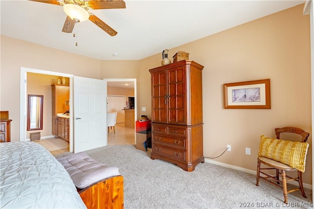 carpeted bedroom with ensuite bathroom